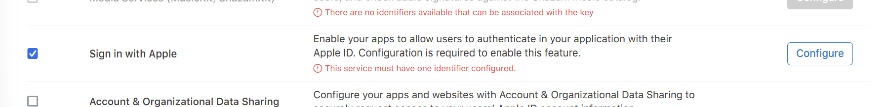 Sign in with Apple checked on the new key, with the Configure button